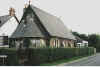 Exterior view of  St Osward Church. Click on the link below to learn more.