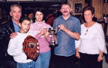 Chris' widow Eleanor, son David and parents in the High Society, with pub boss Matt Davey (still with his moustache).
