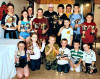 Our picture shows youngsters looking justifiably happy as they show off their trophies at the gala event. Click here for a full size image.