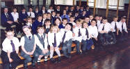 Waiting to be impressed: the electorate at St Cuthbert's Primary want to hear what the candidates have to say. Click here to view full size.