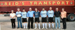 Team at Crosshill Cup.Robert Laidlaw of Reid's Transport (4th left) handed over the new strip to players, management and committee New manager George Logan 2nd right George McCulloch 2nd left.