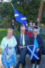 Margaret Kiltie, Alex and Margaret Davidson and a young Italian fly the saltire
